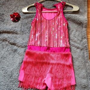 Pink dance costume, sequence, fringe, built in shorts, one piece size 10-12